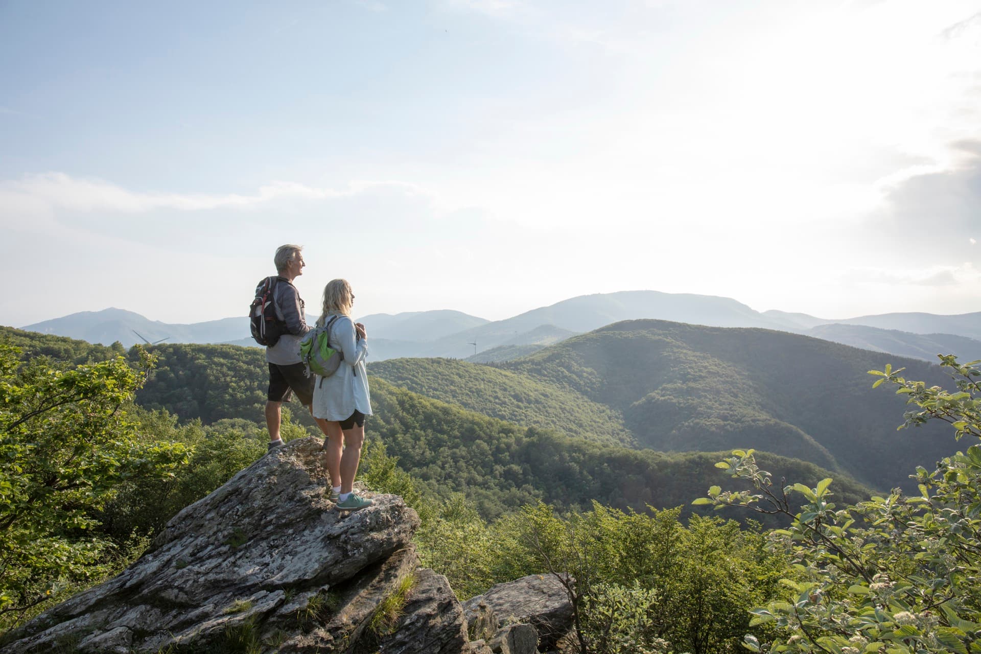 Hikers taking in the view from a Blue Ridge mountain summit